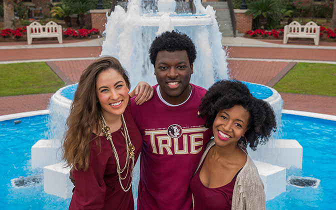 Photo: Students smiling at Westcott fountain