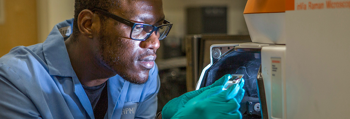 Student working with equipment in lab