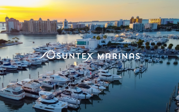 Sunset on boats in the water with text that says Suntex Marina